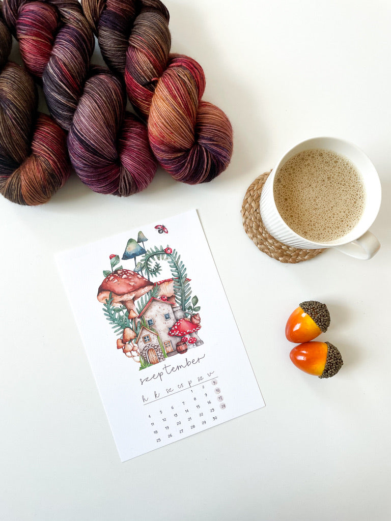 September themed moody coloured hand dyed merino yarn, coffee, a lovely calendar 
